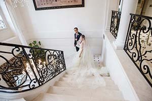 Bride walking down stairs